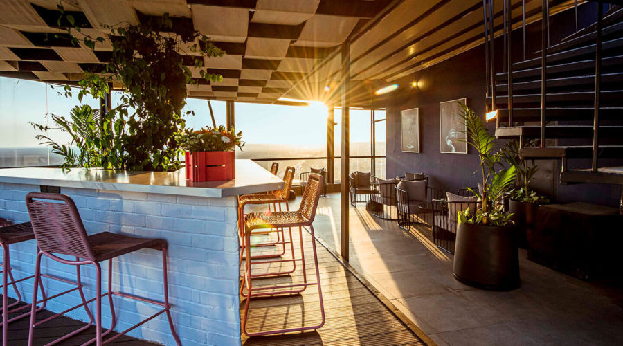 Watch the Sunset from a Rooftop Lounge